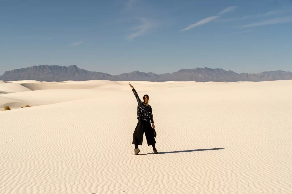 Bailey smiling happily with holiday decorations in the background