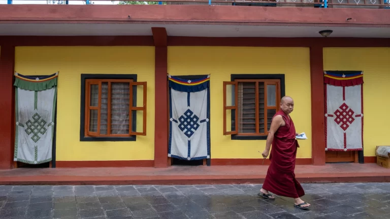 Traditional Tibetan village in Nepal with mountain backdrop