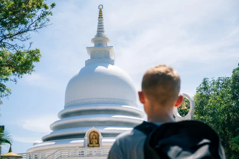 Weligama Sri Lanka beach with stilt fishermen and ocean waves